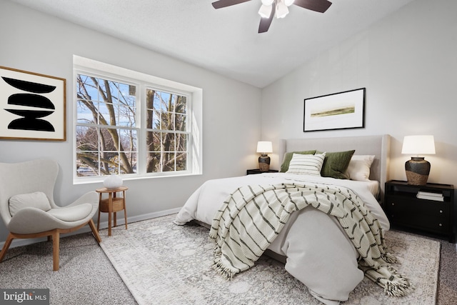 bedroom with lofted ceiling, carpet, and ceiling fan