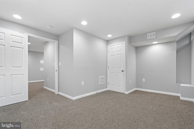 basement featuring carpet floors