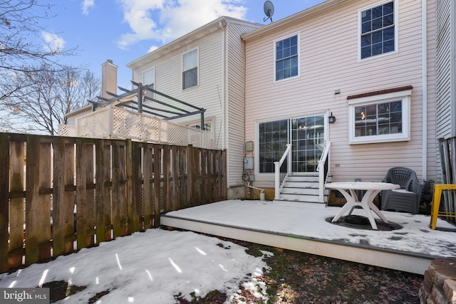 view of snow covered property