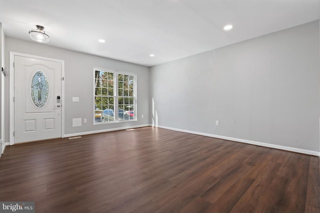 entrance foyer featuring dark hardwood / wood-style flooring