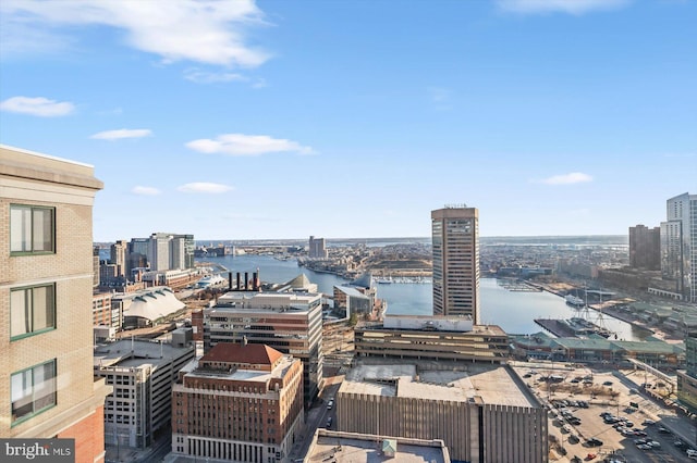 property's view of city featuring a water view