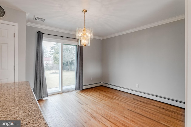 unfurnished dining area with crown molding, a baseboard heating unit, an inviting chandelier, and light wood-type flooring