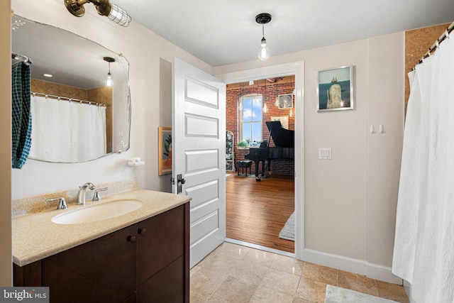 bathroom with vanity and tile patterned floors