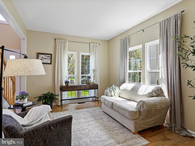 6852 Fielding Ct, Frederick, MD 21703 - living room with a healthy amount of sunlight and wood finished floors