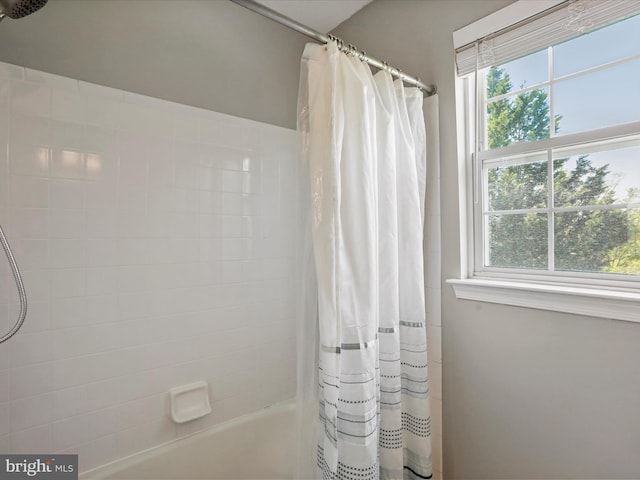 6852 Fielding Ct, Frederick, MD 21703 - bathroom featuring shower / bath combo with shower curtain