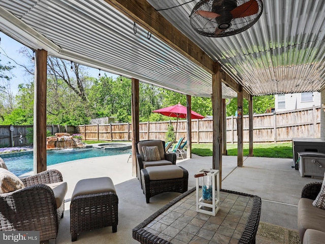 6852 Fielding Ct, Frederick, MD 21703 - view of patio / terrace with a fenced backyard, ceiling fan, and a pool with connected hot tub
