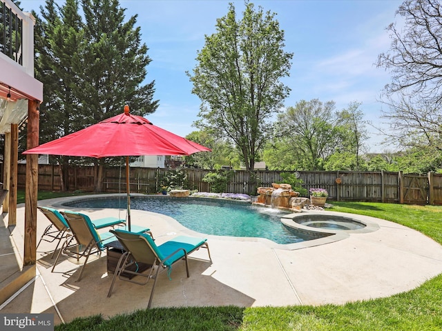 6852 Fielding Ct, Frederick, MD 21703 - view of swimming pool featuring an in ground hot tub, a lawn, a patio area, a fenced in pool, and a fenced backyard