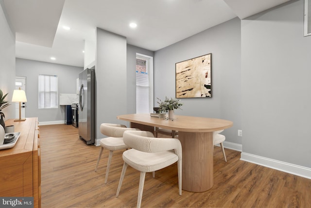 dining room featuring hardwood / wood-style flooring