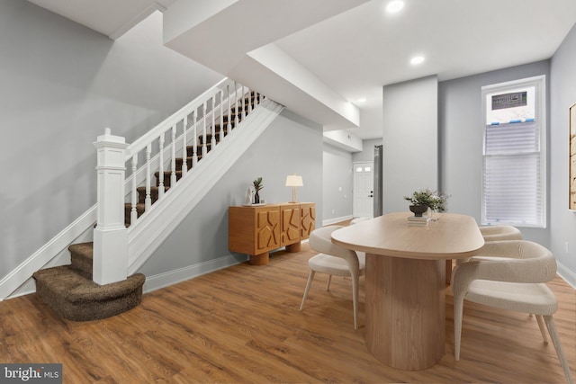 dining space featuring hardwood / wood-style flooring