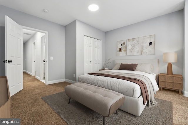 carpeted bedroom with a closet