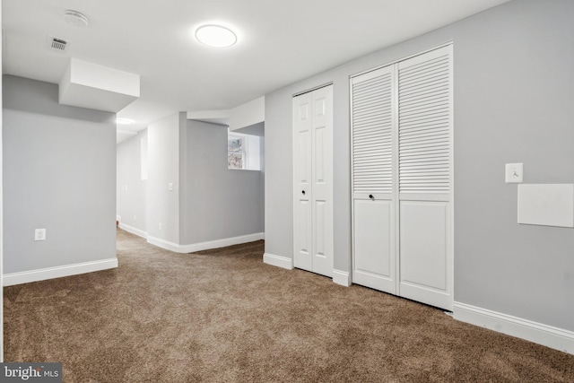 basement featuring carpet