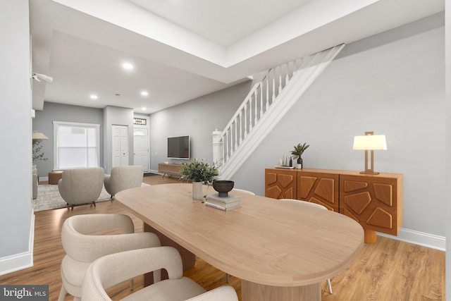 dining space featuring light hardwood / wood-style floors