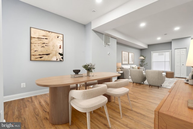 dining space featuring light hardwood / wood-style floors