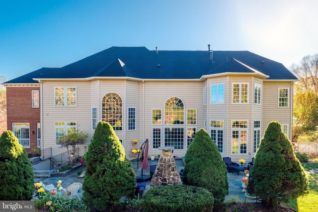 back of house featuring a patio area