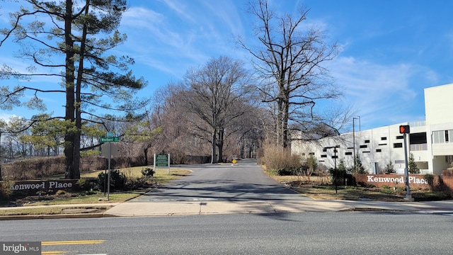 view of road featuring curbs