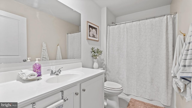 18075 Coolidge Ln, Bowling Green, VA 22427 - full bath with toilet, vanity, and a shower with curtain