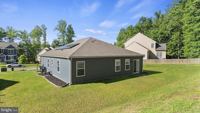 18075 Coolidge Ln, Bowling Green, VA 22427 - back of house with solar panels and a shingled roof