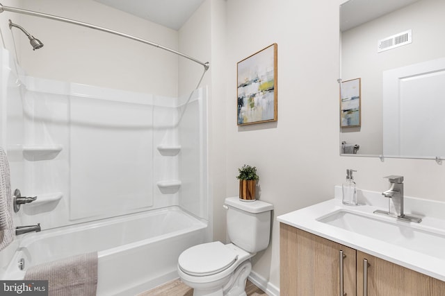 full bathroom featuring vanity, toilet, and shower / washtub combination