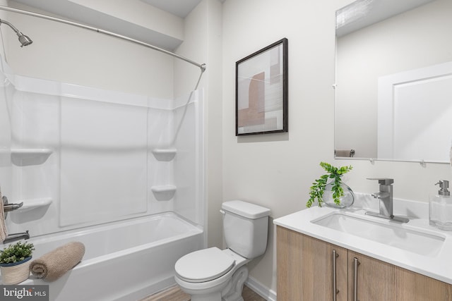 full bathroom with vanity,  shower combination, and toilet