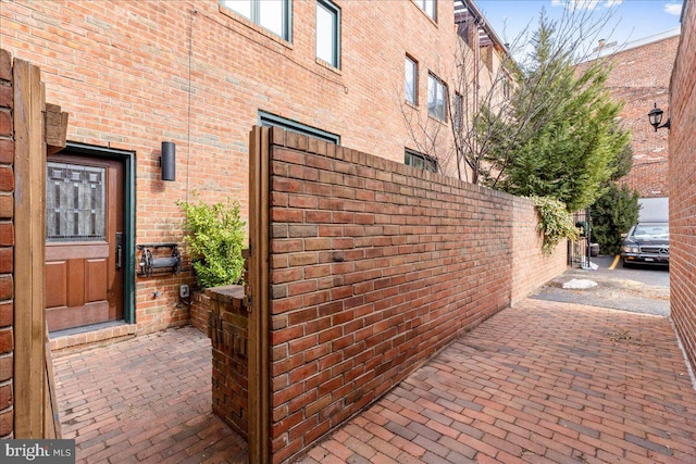 view of property exterior featuring a patio area