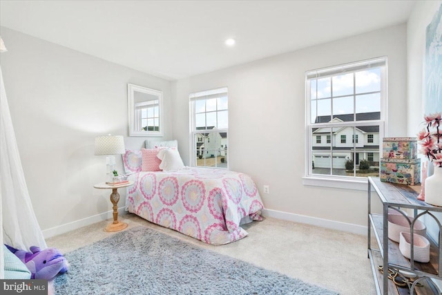 bedroom with carpet, baseboards, and recessed lighting