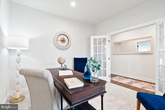 office featuring french doors, baseboards, and wood finished floors