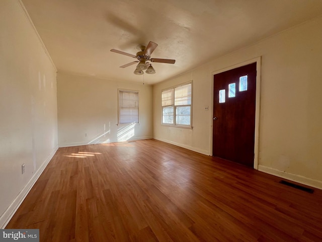 foyer entrance featuring hardwood / wood-style flooring and ceiling fan