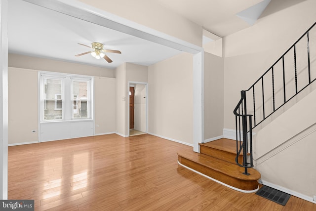 interior space featuring ceiling fan and light hardwood / wood-style flooring