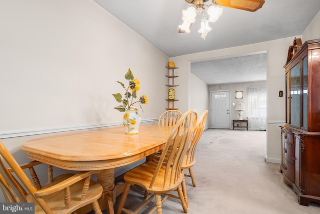 view of carpeted dining area