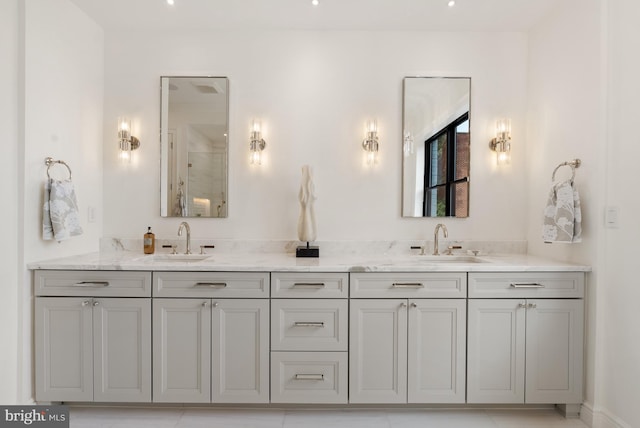 full bathroom with walk in shower, a sink, and double vanity