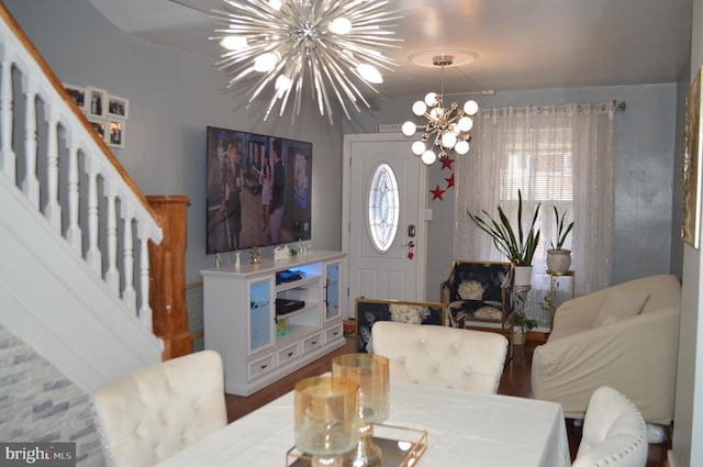 living room with an inviting chandelier