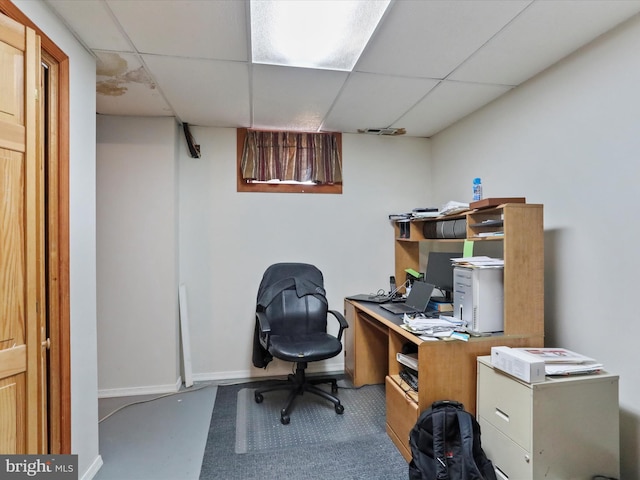 office with baseboards and a drop ceiling