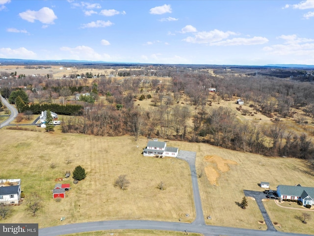 birds eye view of property featuring a rural view