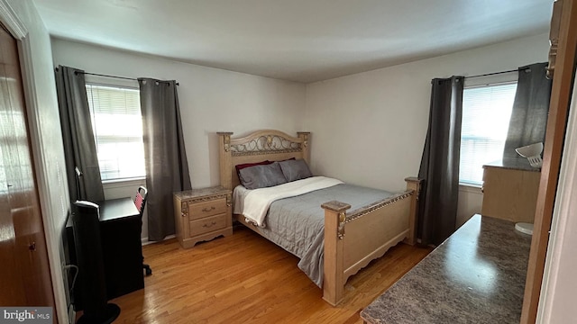 bedroom featuring light wood-type flooring