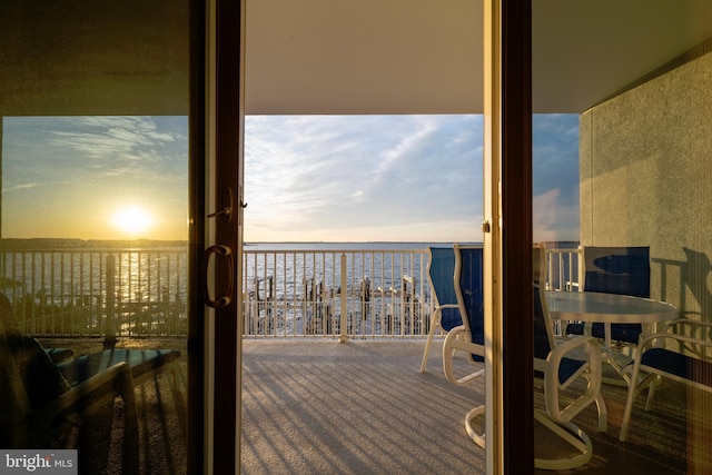 deck at dusk with a water view