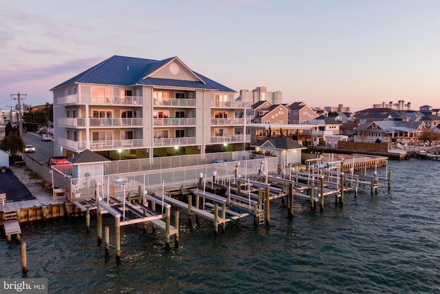 dock area with a water view