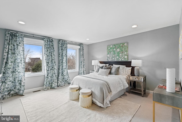 bedroom featuring recessed lighting, carpet, visible vents, and baseboards