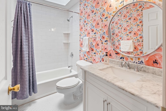 bathroom with shower / tub combo, vanity, and toilet