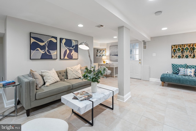 living area with recessed lighting, visible vents, baseboards, and light tile patterned floors