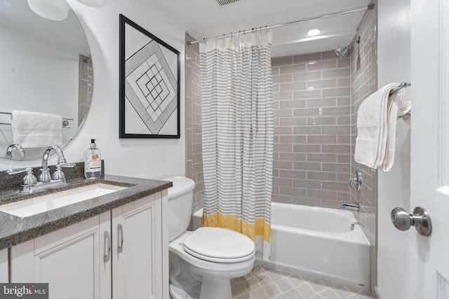 bathroom featuring toilet, shower / bathtub combination with curtain, visible vents, and vanity