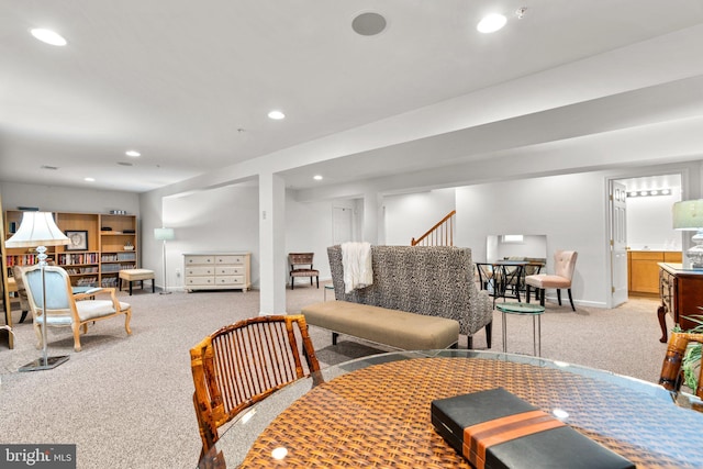 living room with light colored carpet