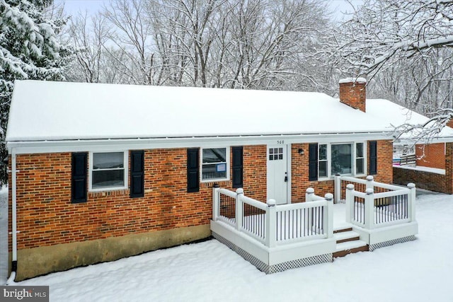 view of snow covered property