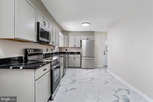 kitchen featuring appliances with stainless steel finishes and sink