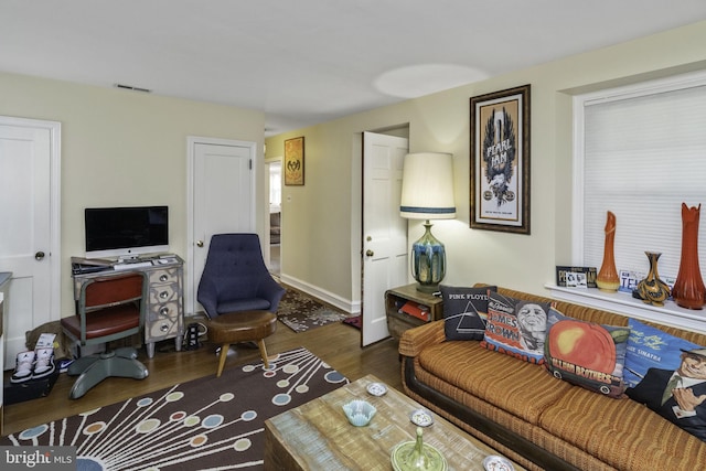 living room with dark wood-type flooring