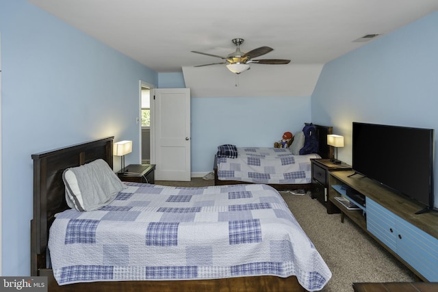 bedroom with dark colored carpet and ceiling fan