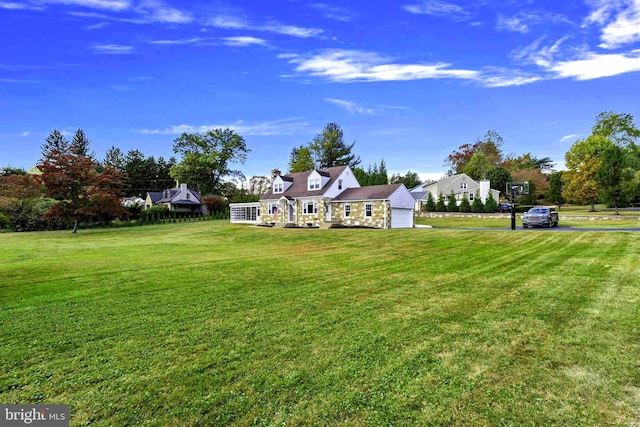 view of yard featuring a garage