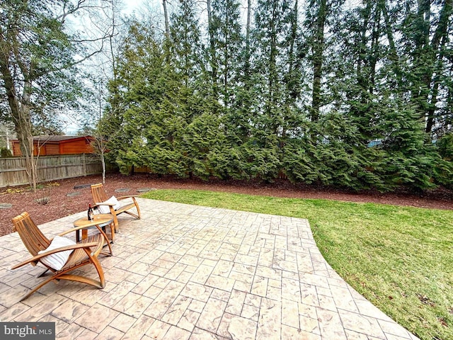 view of patio with fence