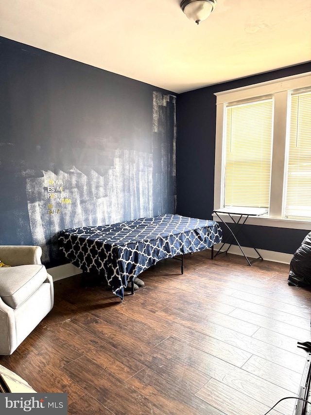 bedroom featuring hardwood / wood-style flooring