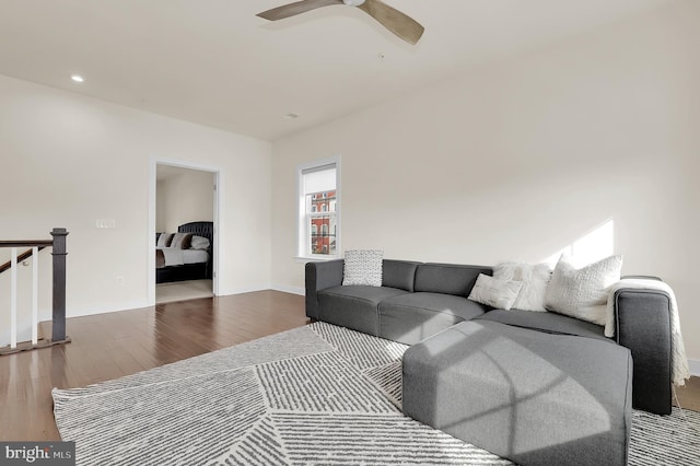 living room with recessed lighting, ceiling fan, baseboards, and wood finished floors