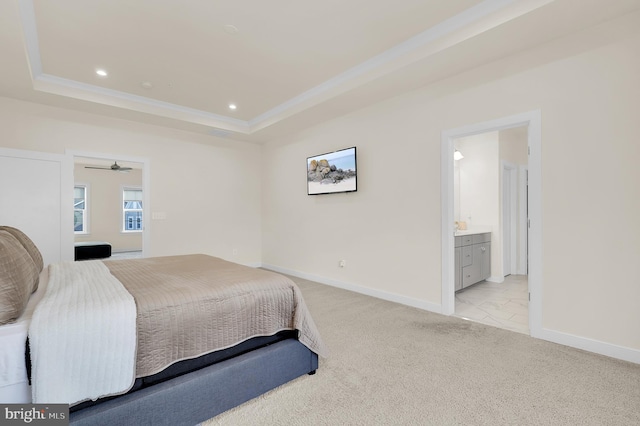 bedroom featuring a tray ceiling, light colored carpet, baseboards, and recessed lighting